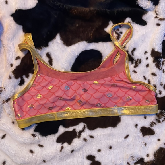 a pink and gold two piece bathing suit with a sea shell charm - Picture 2 of 2